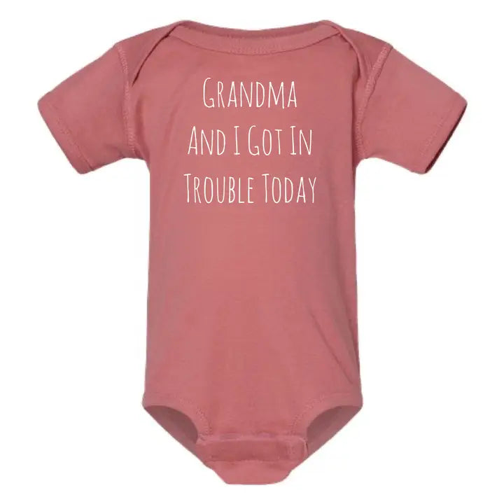 DK ASST ONESIE W/SAYING